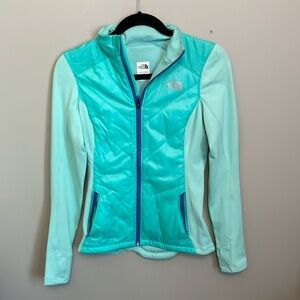 The North Face Blue light Jacket with High Collar and Slim Fit